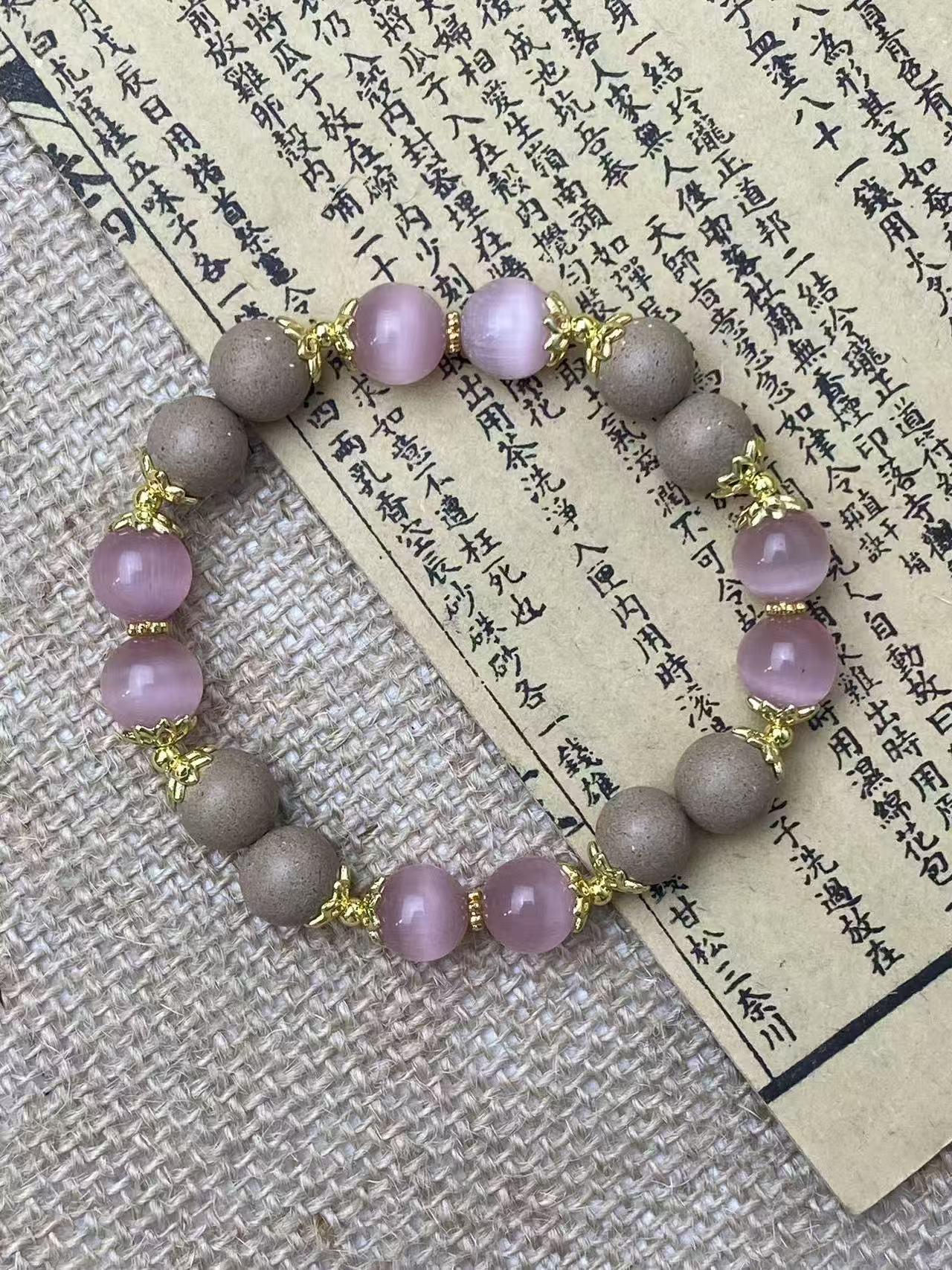 龙涎香珠间绯色水玉手链