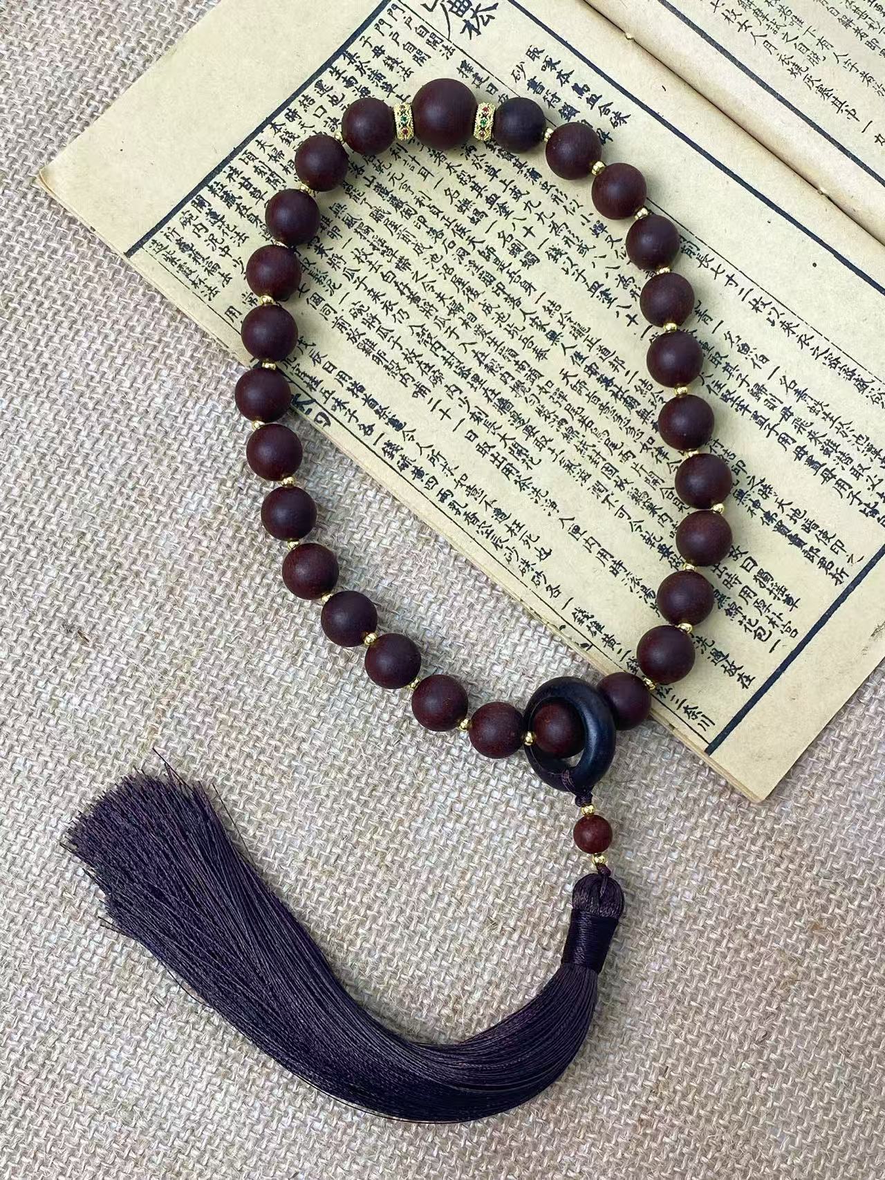 固本培元香咖啡色流苏手持